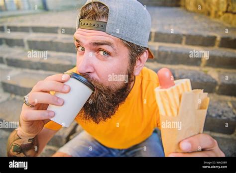 Junk Food Carefree Hipster Eat Junk Food While Sit Stairs Snack For Good Mood Guy Eating Hot