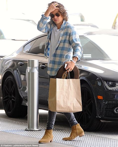 One direction star harry styles declares his love for chelsea boots (and ryan gosling) after heart monitor test reveals what really gets his pulse racing. Harry Styles enjoys last day off One Direction's Where We ...