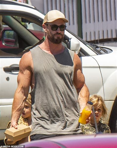 Thor Blimey Chris Hemsworth Shows Off His Bulging Biceps In A Muscle