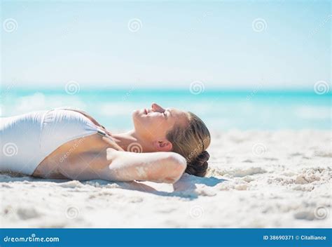 Relaxed Young Woman Tanning On Beach Stock Image Image Of Space Relax 38690371