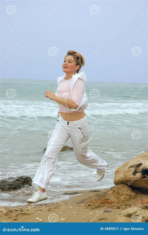 Beautiful Mature Women Running On A Beach Stock Image Image Of Mature