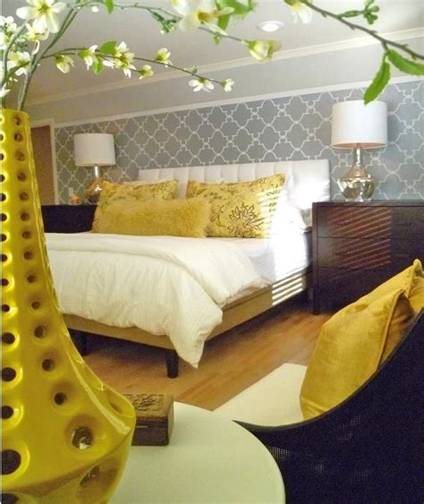 The walls of the master bedroom were given an antiquated metallic finish by artist patricia arnillas. gray & yellow master bedroom | Yellow master bedroom ...