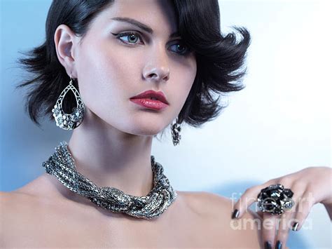 Portrait Of A Beautiful Woman Wearing Jewellery Photograph By Oleksiy