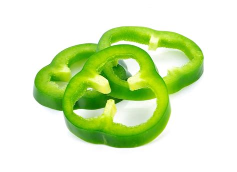 Premium Photo Sliced Green Pepper Isolated On White