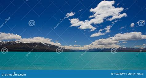 Turquoise Mountain Lake Stock Image Image Of Clouds 16574899