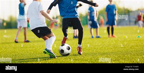 Boy Kicking Soccer Ball Close Up Action Of Boys Soccer Teams Aged 8