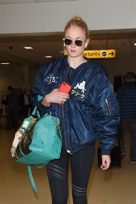 Turner wore a red jacket as a dress and tall black boots, while williams came in colorful. SOPHIE TURNER Arrives at Aberdeen Airport for Kit Harington and Rose Leslie Wedding 06/22/2018 ...