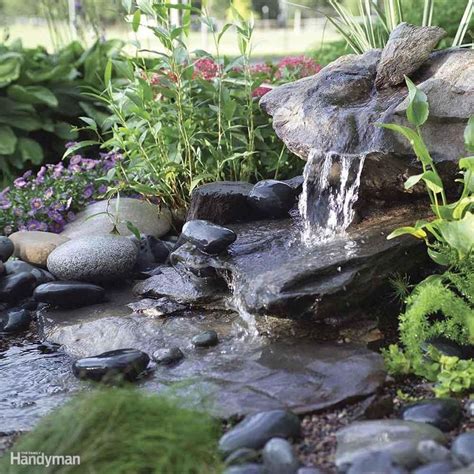 Small Rock Water Feature With Some Flat Rocks And A Nice Drop To Create Some Sound Water