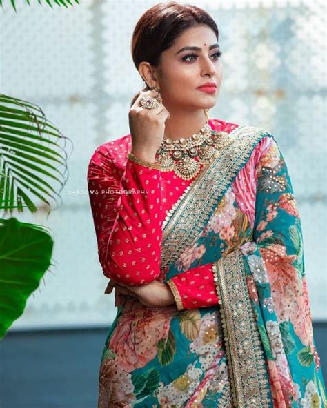 Sneha Prasanna Looks Delightful In A Turquoise Floral Saree Saree