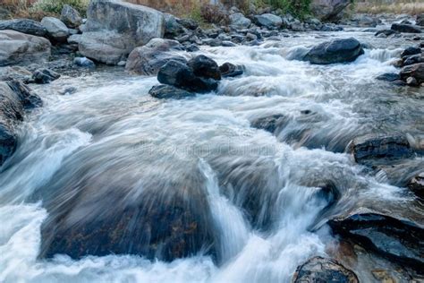 River Water Flowing Through Rocks At Dawn Stock Image Image Of