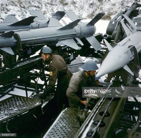 east german and soviet soldier loading a sam system during warsaw pact exercises 1980 warsaw