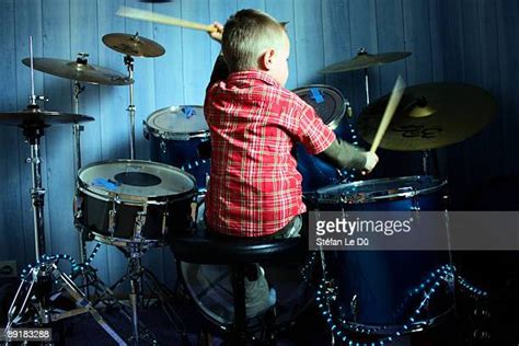 Little Kid Playing Drums Stock Fotos Und Bilder Getty Images