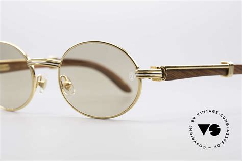 One of cartier's earliest major successes was the santos de cartier watch — one of the world's first modern wristwatches for men. Sunglasses Cartier Giverny Oval Wood Sunglasses | Vintage ...