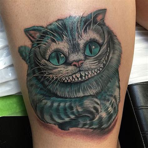 He's distinguished by his large eyes, impish attitude, and large grin. awesome cheshire cat tattoos | Tatuajes disney, Gato de ...