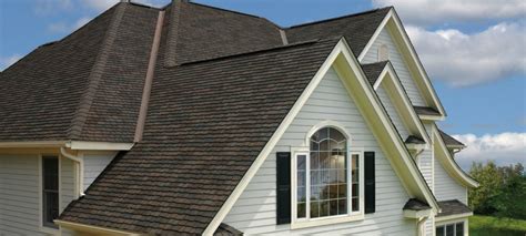 While the cedar shake shingles were noticeably pulling up in numerous areas, they had once been a major contributor to the curb appeal of thomas' home. GAF_Glenwood_Dusky_Gray_HERO_2880x1300D | Shibam Ventures