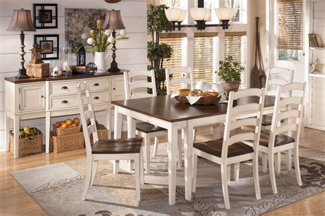 Viktor three piece dining set kitchen pub table white marble table top, light brown wood base, light beige fabric seat. Whitesburg Dining Table + 6 Side Chairs at Gardner-White