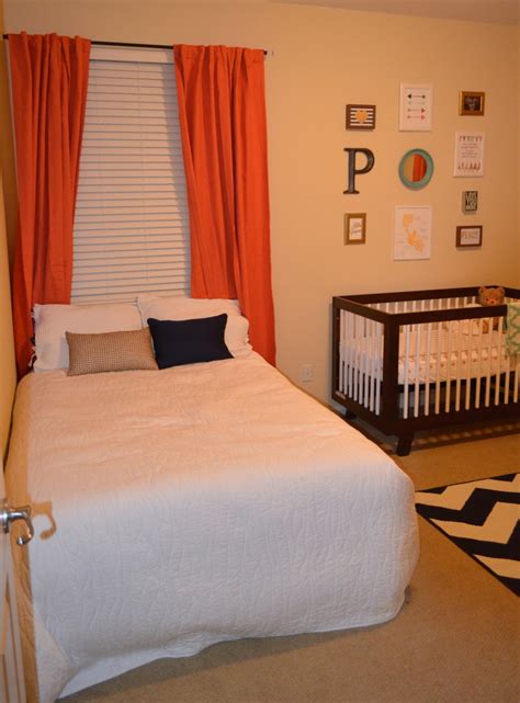 A navy and coral nursery inspired from many sources. Coral and Navy Nursery with Pops of Gold - Project Nursery