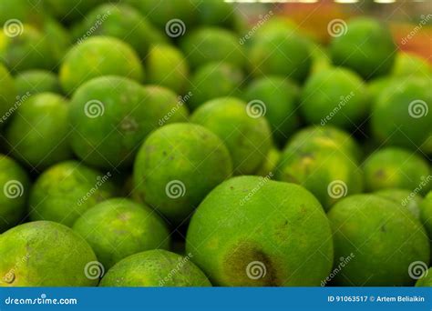 Green Fresh Mandarins On A Local Organic Farm Market Of Tropical Bali