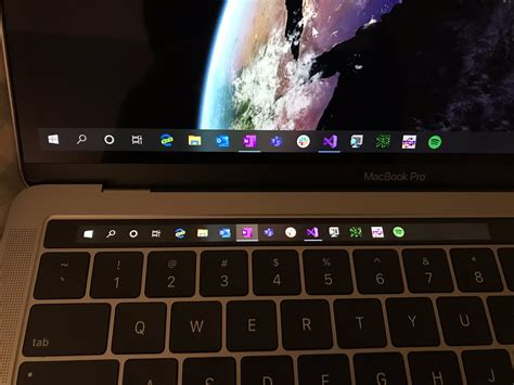 Macbook Pros Touch Bar Finally Comes Alive Under Windows 10