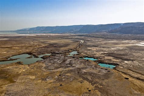 Sinkholes In Northern Dead Sea Area Photograph By Ofir Ben Tov Pixels
