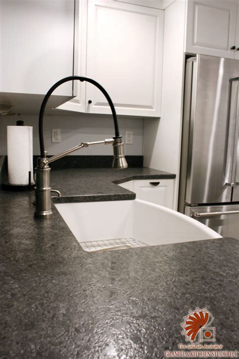 Viscont white granite kitchen island with stainless steel double sink. Steel Gray Leathered - Granite & Kitchen Studio