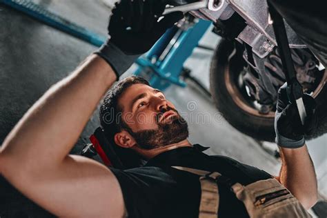 162 Mechanic Lying Working Under Car Stock Photos Free And Royalty Free