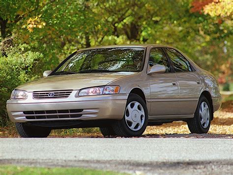 Dual exhaust with diffuser electrically adjustable rear view mirrors with side indicators sports front grille. TOYOTA Camry specs & photos - 1997, 1998, 1999, 2000, 2001 ...