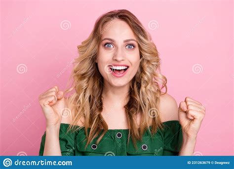 photo of excited hopeful lady raise fists open mouth wear naked shoulders green blouse isolated