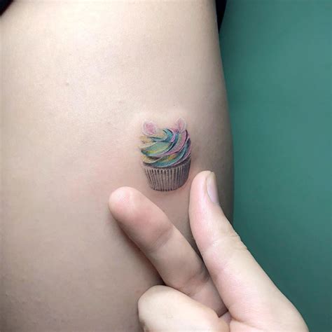 Cupcake By Ray Thightattoos Cupcake Tattoos Tiny Tattoos Cupcake
