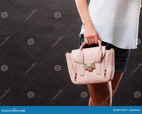 fashionable girl holding bag handbag stock image image of woman outfit 62614543