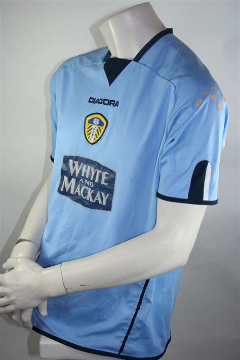 Хоть 20 добавь к2 не хочет или не может. Diadora Leeds United Trikot 2004/05 Whyte and Mackay ...