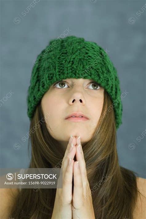 Teenage Girl Praying Portrait Superstock