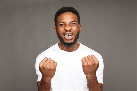 Success Excited Black Man With Happy Facial Expression Stock Image