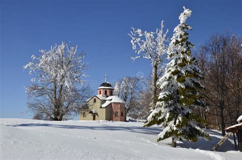 Snow Covered Church On Mountain Top Stock Photo Image Of Dramatic