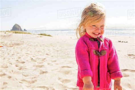 Girl Smiling On Beach Stock Photo Dissolve