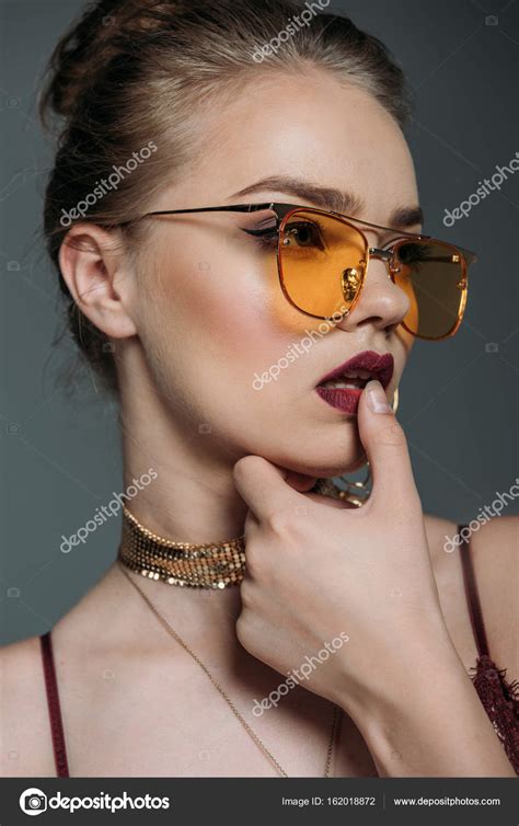 Seductive Model In Orange Sunglasses Stock Photo Allaserebrina