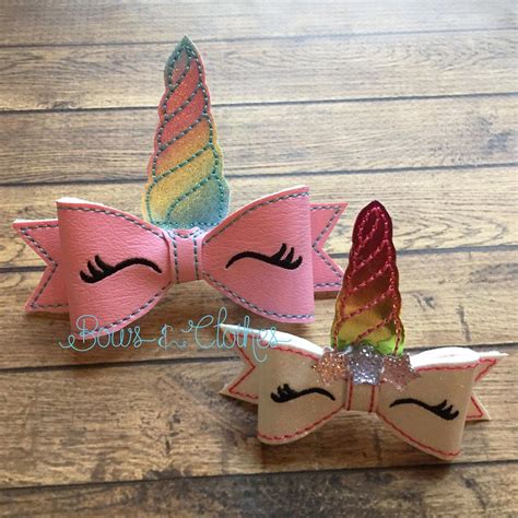 Time to start your bow hairstyle. Unicorn Bow | Machine embroidery, Diy hair bows, Felt bows