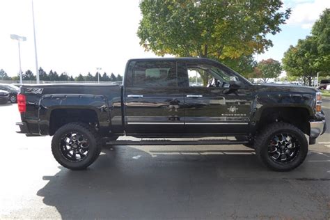 Even without the high country's perforated leather and extensive comfort/convenience touches crew cabs are available with a 5'8 or 6'6 bed. Pre-Owned 2014 Chevrolet Silverado 1500 LTZ Black Widow ...