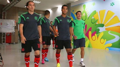 Andres guardado confirms atlanta interest, says club haven't made offer. Andres Guardado (L) and Giovani dos Santos of Mexico walk ...