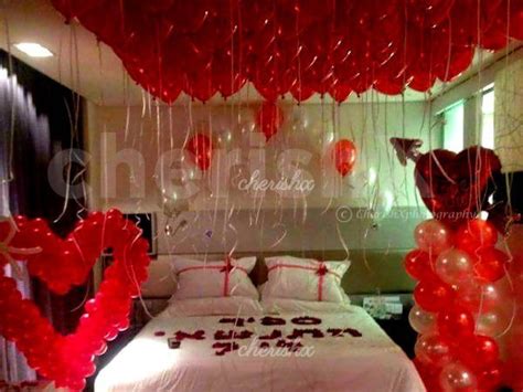 The layers of knit and quilted bedding, the gorgeous carved frames on the mirrors, the area rug layered over tile, the silky fabric on the pouf. Romantic Balloon Decoration at Home in Indore