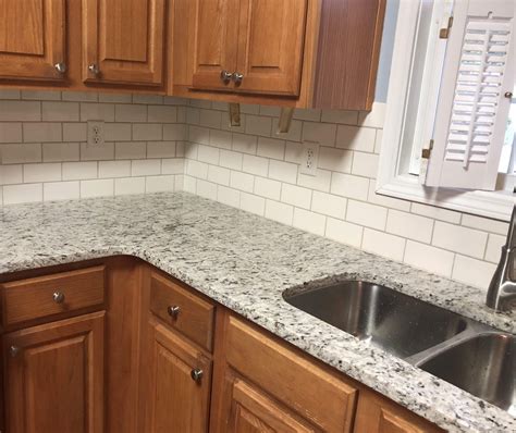 Ivory Subway Tile On A Kitchen Backsplash Home Remodeling Tile