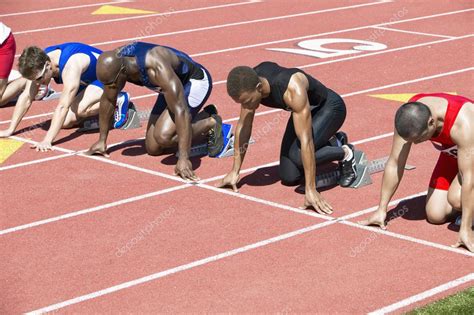 Male Athletics At Starting Block Stock Photo By ©londondeposit 33807959
