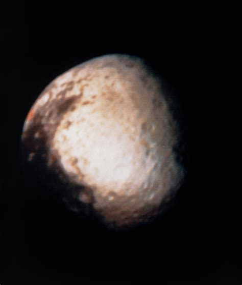 Voyager 2 Photograph Of Saturns Moon Iapetus Photograph By Nasa