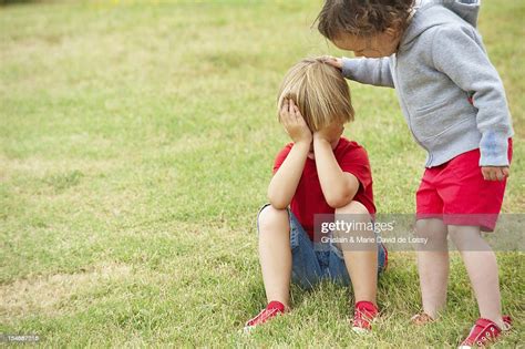 Young Child Comforting Sad Young Friend High Res Stock Photo Getty Images