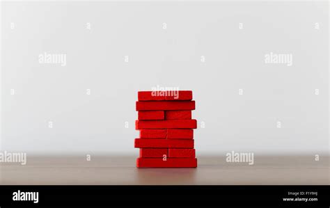 Stack Of Red Wooden Bricks Stock Photo Alamy