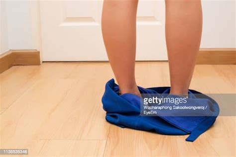 Taking Off Her Dress Photos And Premium High Res Pictures Getty Images