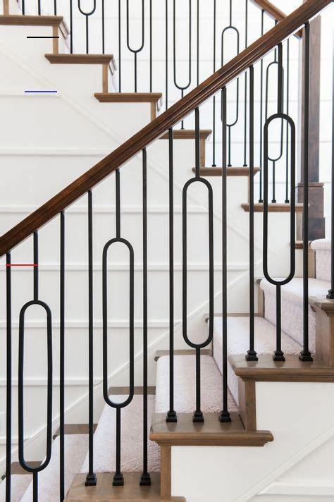 The stairs are beautiful and welcoming when you first walk into the home. Modern Farmhouse Staircase Iron Baluster Design Ideas - #staircaserailings in 2020 | Iron ...