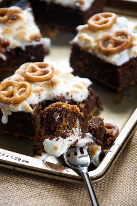 Spread out a piece of parchment paper and cover it with a small amount of the marshmallow dust. Toasted Marshmallow Brownies with Cinnamon Sugar Pretzel Crust
