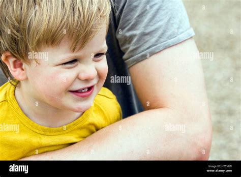 Father Holding His Son Stock Photo Alamy