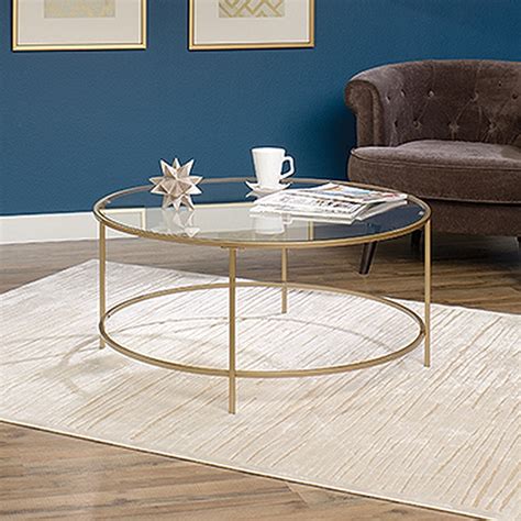 With our desks & tables in a wide range of sizes and styles, you'll find one that fits whatever you want to do in whatever space you have. Round Glass-Top Contemporary Coffee Table in Satin Gold ...